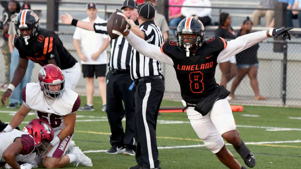 Lakeland’s Joshua Smith celebrates after recovering a St. Joseph’s Prep fumble near the goal line on Friday at Bryant Stadium in Lakeland. 